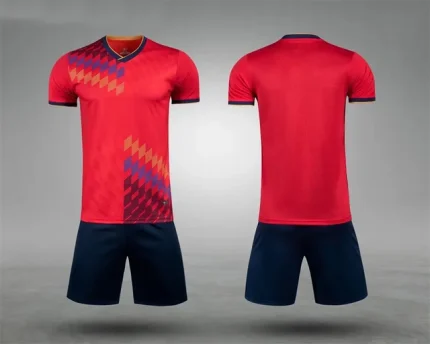 "Ravishing Red: High-Performance Tee and Black Shorts Football Uniform - A dynamic football kit featuring a vibrant red short-sleeve tee paired with sleek black shorts, designed for optimal performance and comfort on the field."