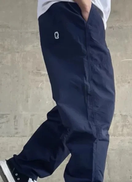 A pair of stylish dark blue cotton trousers featuring a tailored fit and a classic design. Made from high-quality cotton fabric, these trousers showcase a deep navy color that adds sophistication to any outfit. Ideal for both casual outings and smart occasions, they can be easily paired with various tops, from casual tees to button-down shirts.