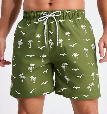 "Men’s blue printed athletic shorts featuring vibrant sublimation designs, designed for comfort and flexibility, displayed against an outdoor backdrop, perfect for summer activities."